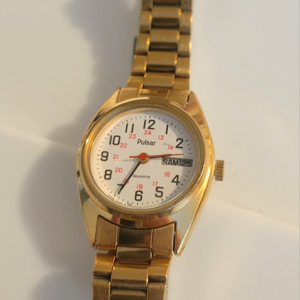 Pulsar Gold and White Quartz Watch